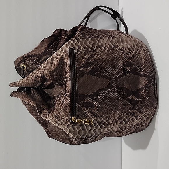Moschino Handbags - Moschino Snakeskin Print Drawstring Backpack